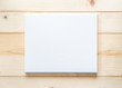 © Chinnapong - Blank canvas frame mockup rectangular size on white wood wall for arts painting and photo hanging interior decoration