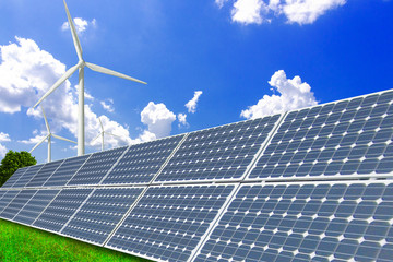 Wall Mural - Wind turbines and solar panels on vast grasslands