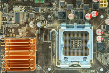 The components of the motherboard. Include chip, ic, cpu socket, heatsink and many port.