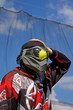© sablin - joueur de Paintball de competition avec un impact de peinture sur le masque.