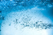 Leinwanddruck Bild Many bubbles in water close up, abstract water wave with bubbles