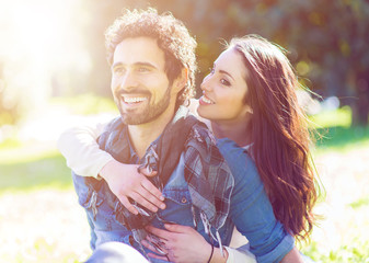 Wall Mural - couple having fun outdoors