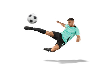 soccer player kicking the ball in the air isolated on white