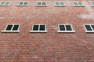 Canvas Print - Red brick building wall