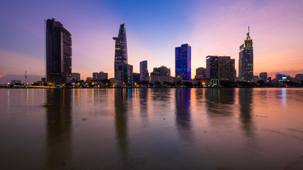 Wall Mural - Beautiful landscape sunset of Ho Chi Minh city or Sai Gon, Vietnam. Royalty high-quality free stock image of Ho Chi Minh City with skyscraper buildings. Ho Chi Minh city is the biggest city in Vietnam