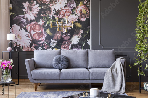 Industrial Golden Pendant Light And Black Furniture In A
