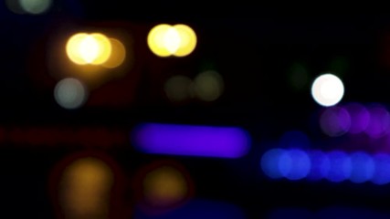 Wall Mural - 4k video of the colorful bokeh lights. the lights are slowly moving from one side to another.