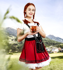 Bavarian woman and green background space 