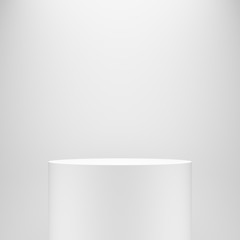 white blank empty cylinder pedestal template in front of white wall