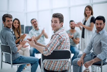 business team applauds the speaker at the workshop