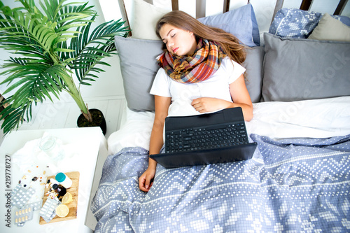 Stampa su Tela ill young girl with fever spending time at home