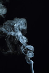  White smoke texture on black background