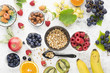 © annaileish - Ingredients for healthy breakfast meals: raspberries, blueberries, nuts, orange, bananas, grapes blue, green, apples, kiwi. Top View.