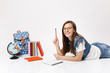 © ViDi Studio - Young smiling pretty woman student in denim clothes, glasses holding pencil notebook lying near globe, backpack, school books isolated on white background. Education in high school university college.