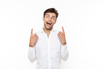 Canvas Print - Portrait of an excited young man in shirt