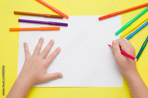 Little Girl S Hand Painting On The White Paper With Pink Color Pen