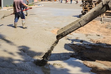 Wall Mural - Workers, smooth concrete screed. Road-building.