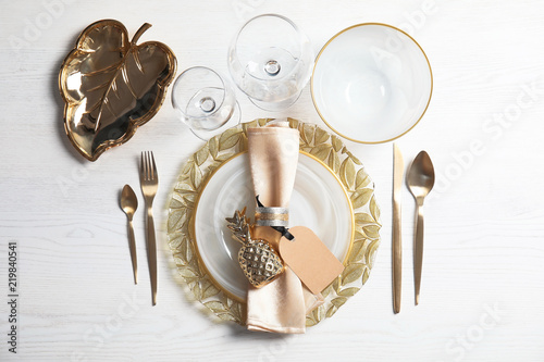 Fotomural Elegant table setting on light background, top view