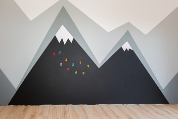 Kids bedroom with mountains chalkboard paint and new laminated floor