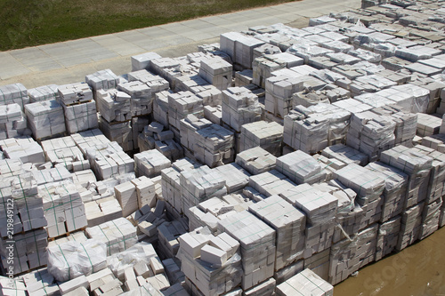 Fotografia, Obraz Aerial view of autoclaved aerated concrete blocks, both defective and good, on p