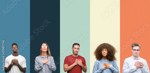 Group of people over vintage colors background smiling with hands on chest with closed eyes and grateful gesture on face Poster Mural XXL