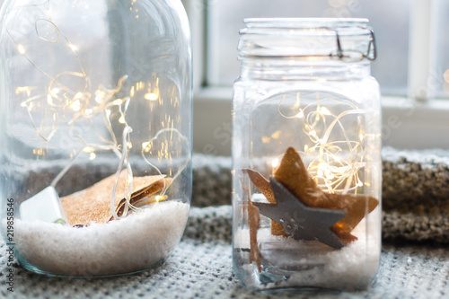 Warm light LED and a jar with dark background Tableau sur Toile