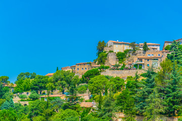 Wall Mural - Bonnieux village in France viewed behind vineyards