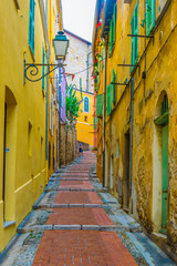 Wall Mural - A narrow street in the old town of Menton, France