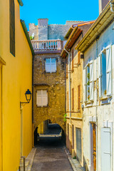 Wall Mural - View of a narrow street in the center of Antibes, France