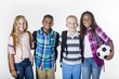 © Brocreative - Group portrait of pre-adolescent school kids smiling on a white background. Back to school photo of a diverse group of children wearing backpacks
