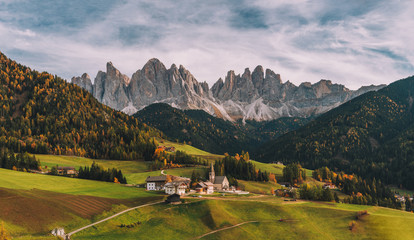 Wall Mural - santa maddalena (st magdalena) village with magical dolomites mountains in background, val di funes 