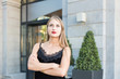 © xartproduction - beautiful young business woman on the street waiting for a meeting with the client