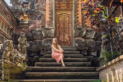 Young Woman Traveler In The Background Of Pura Taman Kemuda
