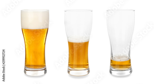 Glasses with different amount of beer on white background Tableau sur Toile