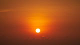 Fototapeta Zachód słońca - scenic of sunrise on golden skyline with cloud