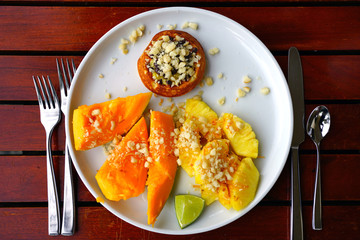 Wall Mural - Healthy breakfast with mini waffle and tropical fruit 