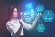 © photon_photo - The concept of business, technology, the Internet and the network. A young entrepreneur working on a virtual screen of the future and sees the inscription: HR