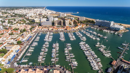 Canvas Print - Aerial view of the bay of the marina, with luxury yachts in Vilamoura.