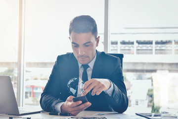 Poster - Internet of things concept,Businessman using smartphone with technologies monitor stock market business and technology concept