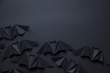 Wall Mural - Halloween spooky dracula bats background made from origami