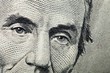 © BillionPhotos.com - Close up of Abraham Lincoln on the Five Dollar Bill