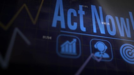 A Act Now business concept on a flashing computer monitor with moving graphs and data.