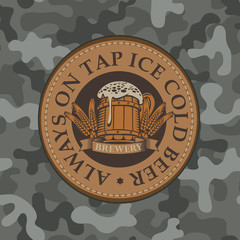 Canvas Print - Vector banner for craft beer with a leather label depicting a full beer glass with ears of wheat on a background of camouflage fabric. Always on tap ice cold beer