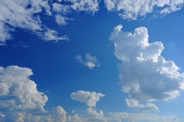 White clouds on the blue sky background