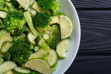 Wall Mural - Green salad with avocado