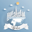 Paper cut style of world famous landmark of Dubai on the earth with label. Vector illustration.