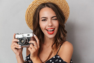 Wall Mural - Close up portrait of a cheerful young girl in dress