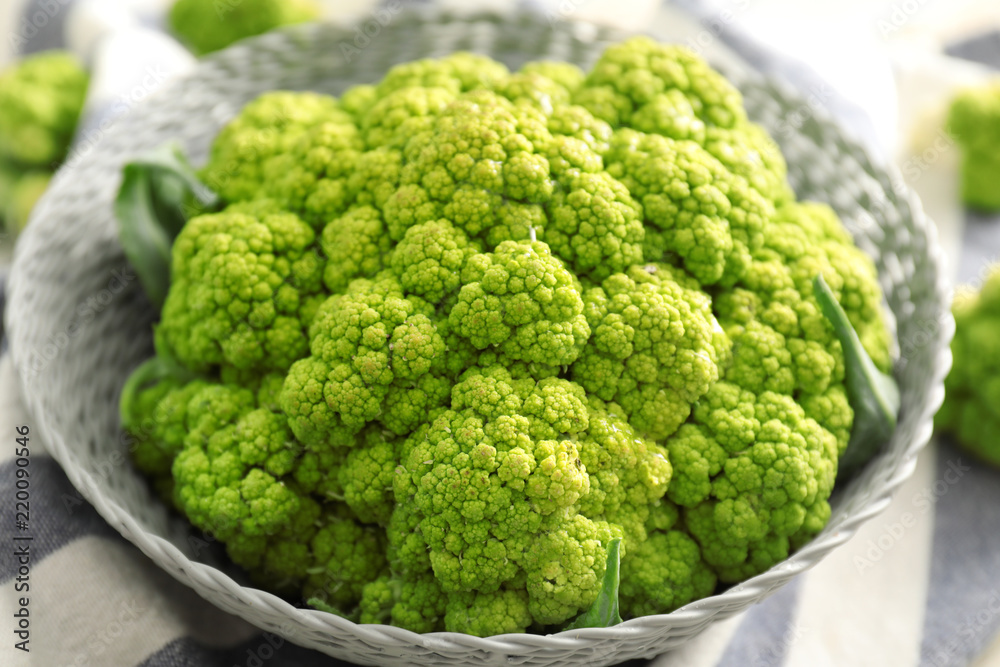 Bowl with green cauliflower cabbage, closeup