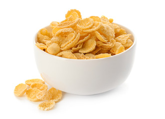 Bowl with healthy cornflakes on white background