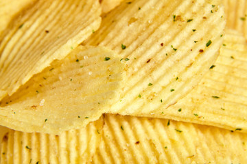 rippled potato chips with condiment